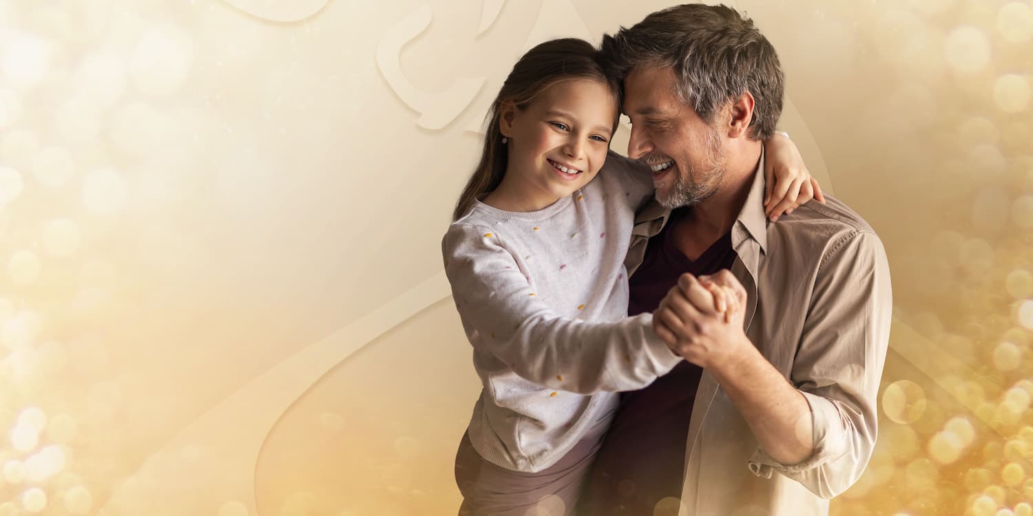 Father and daughter dancing in the Spring